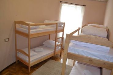 Ліжко в 6-місному змішаному загальному номері (гуртожиткового типу)