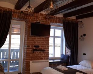 Loft апартаменти з балконом в центрі Львова